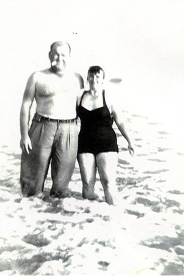 Vertie and Herman standing in the ocean