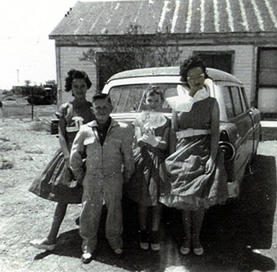 Standing in front of a car