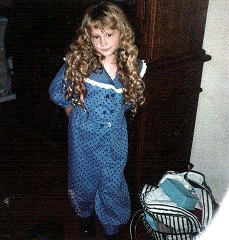 Vicki with long curly hair